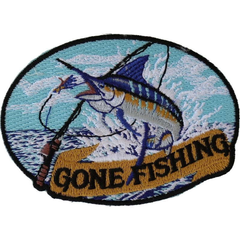 A small embroidered patch featuring an image of a fish with the text 'GONE FISHING' on a background representing water and waves. The patch is in blue, yellow, white, and black colors.