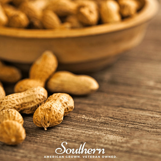 Peanuts in a bowl on a wooden surface with 'Southern' branding.