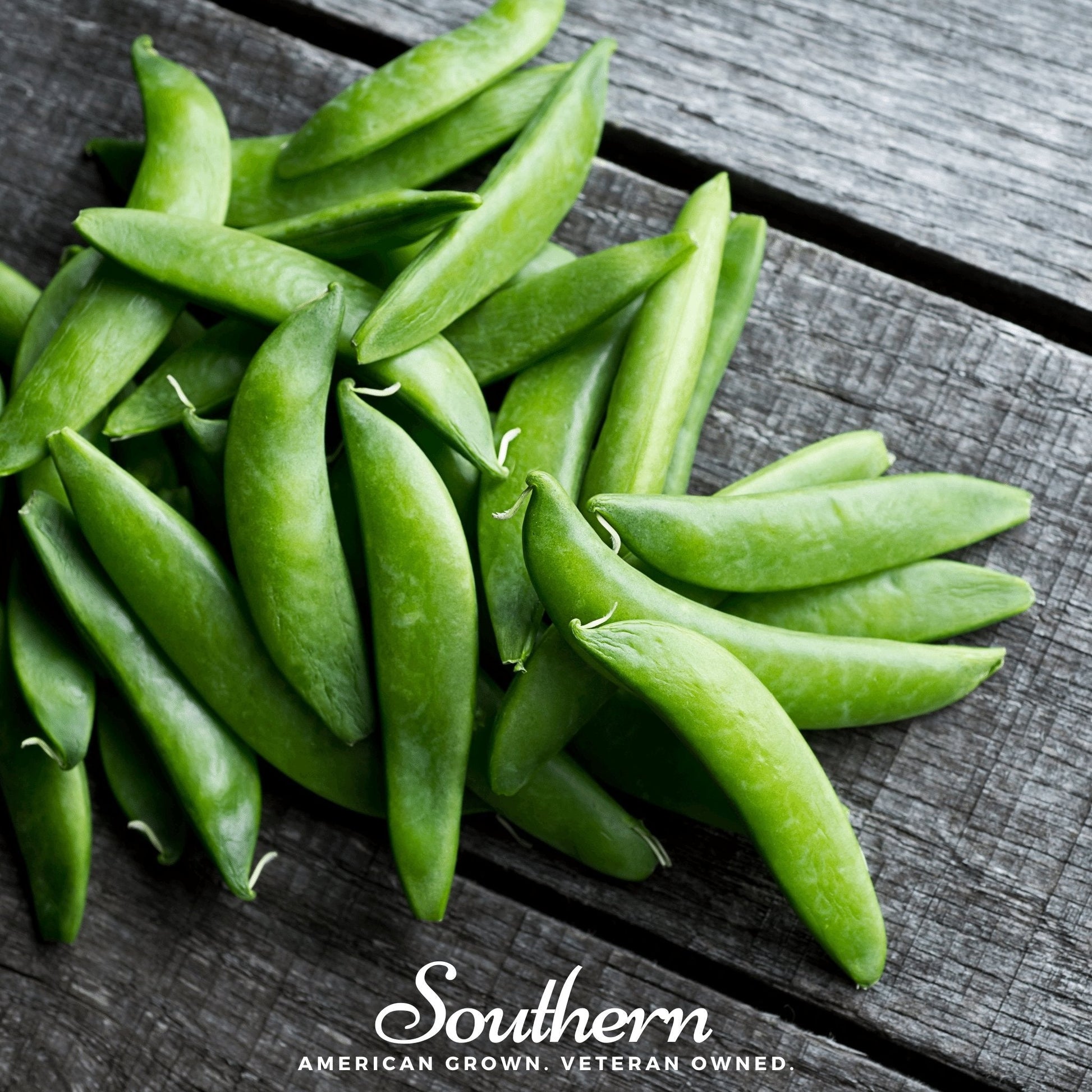 Green snap peas on a wooden surface with 'Southern' branding.