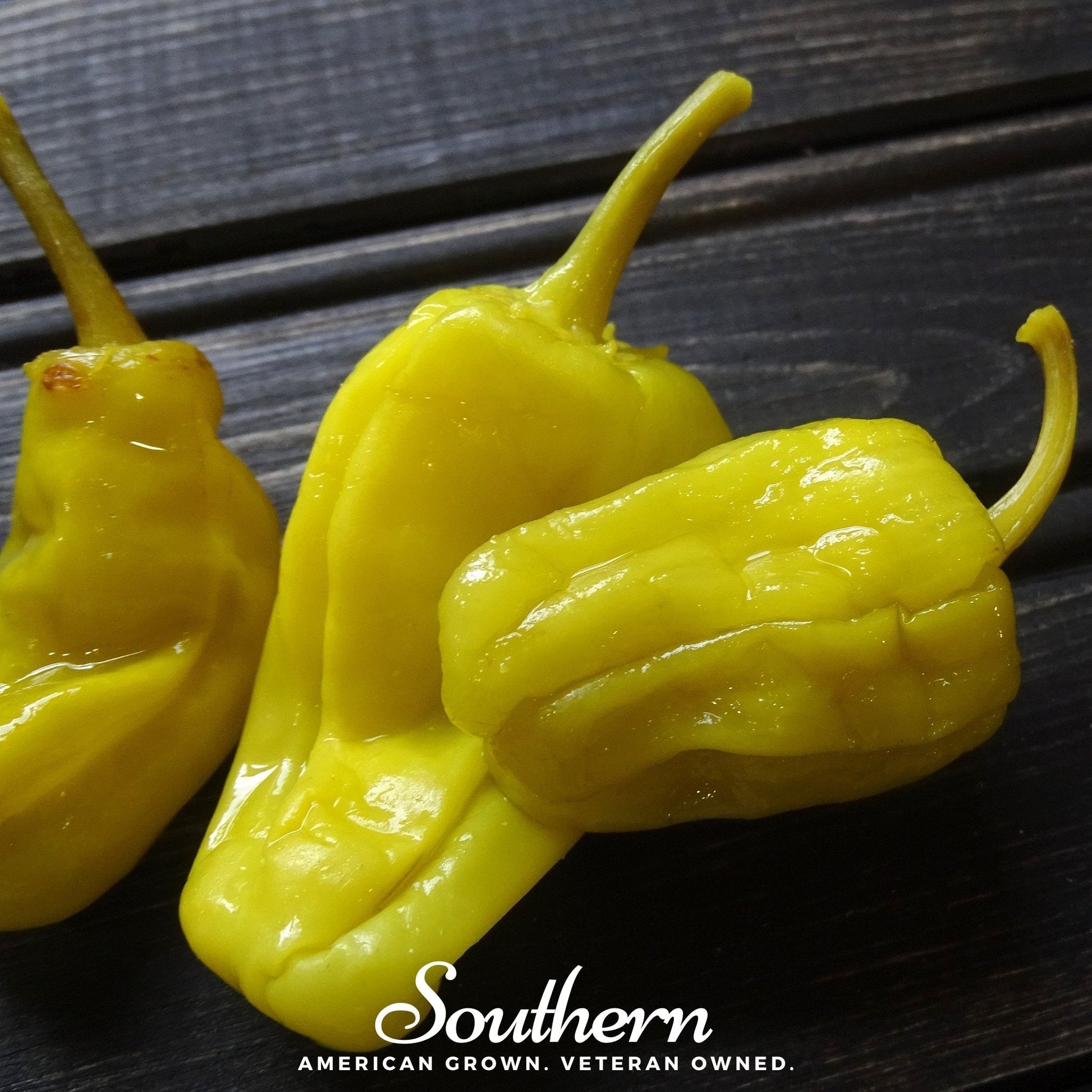 Three yellow peppers on a dark surface with 'Southern' branding.