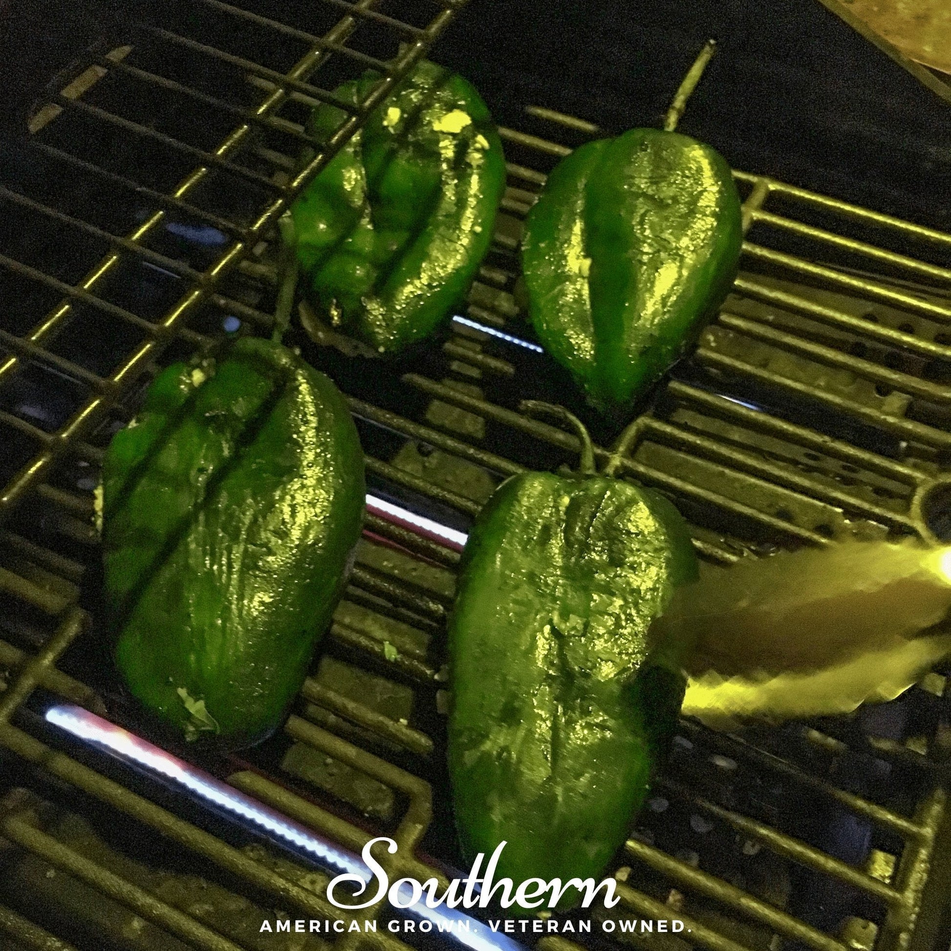 Green peppers being grilled on a barbecue with 'Southern' brand logo.