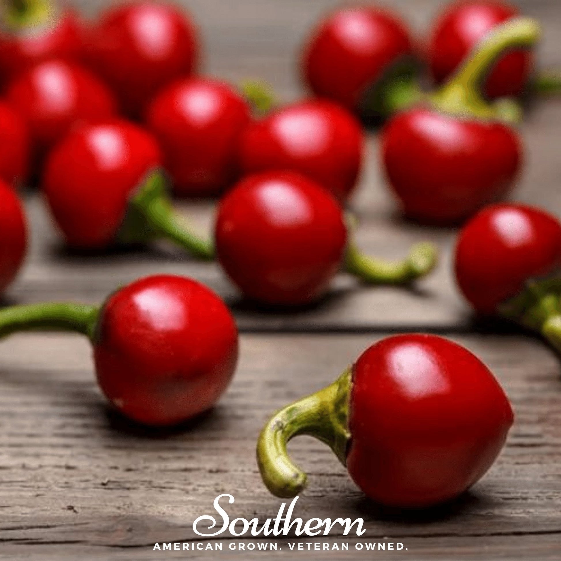 Red peppers on a wooden surface with 'Southern' brand text.