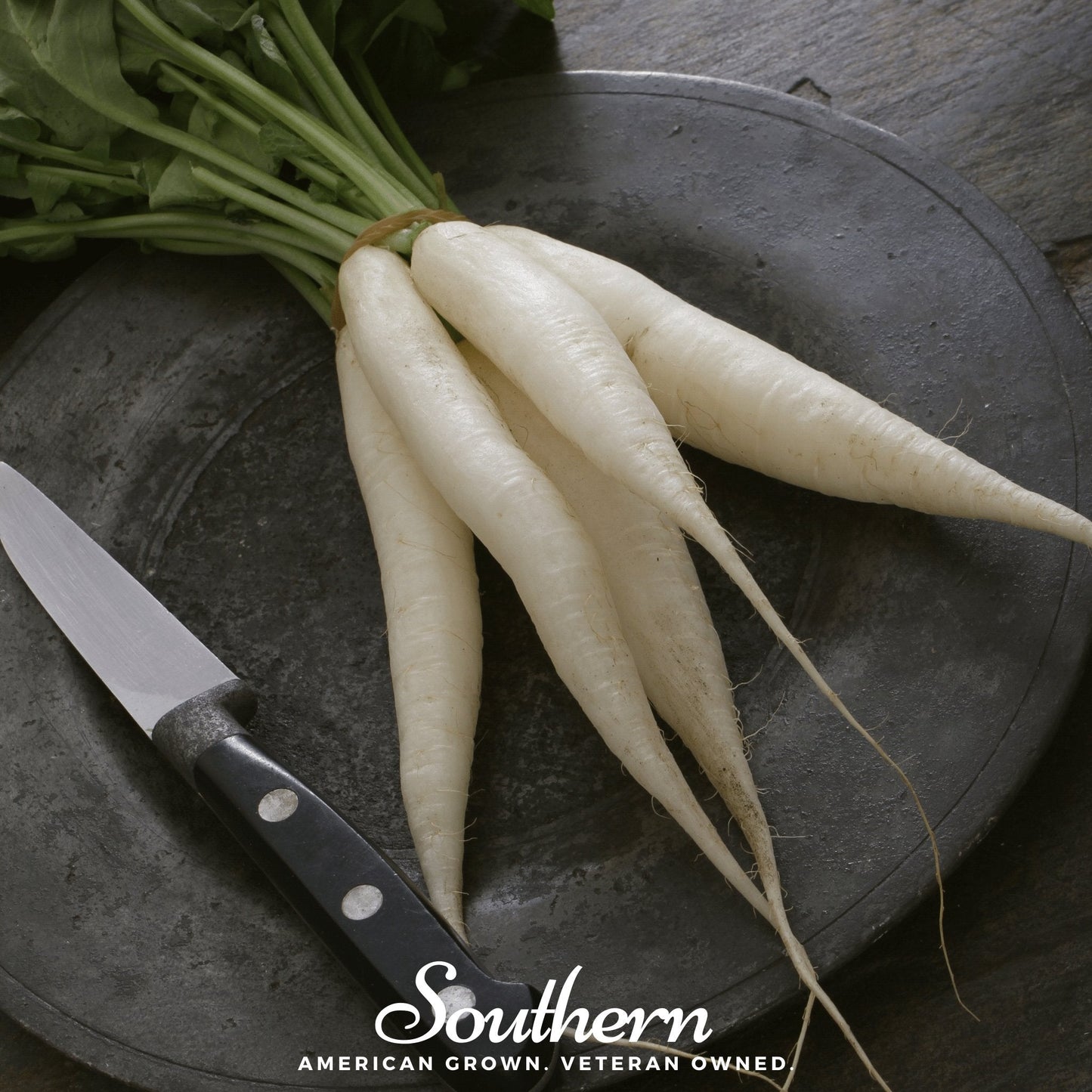 White radishes on a dark surface with a knife, featuring 'Southern' brand text.
