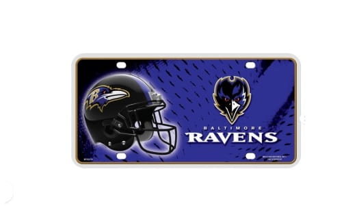 A Baltimore Ravens themed novelty license plate featuring a black football helmet, team logo, and team name on a textured blue and purple background.
