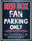 Metal sign with 'Red Sox Fan Parking Only' text on a blue background