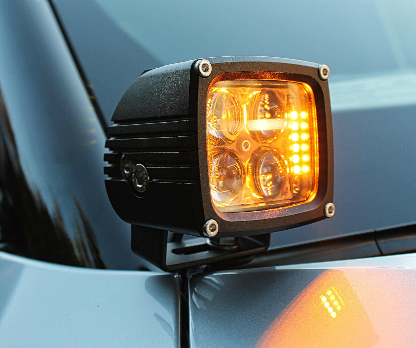 Amber LED light on a vehicle, mounted on the side