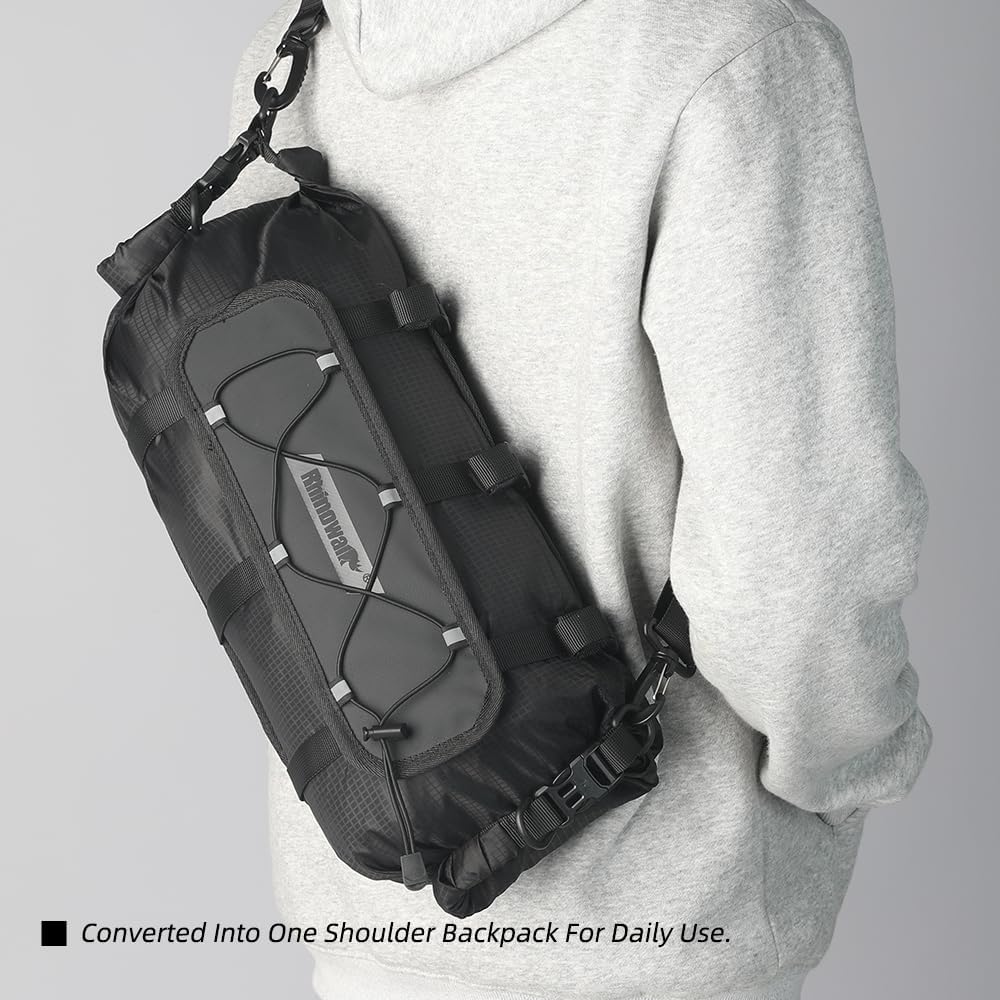 Person wearing a black and gray Bike Bag backpack on a plain background