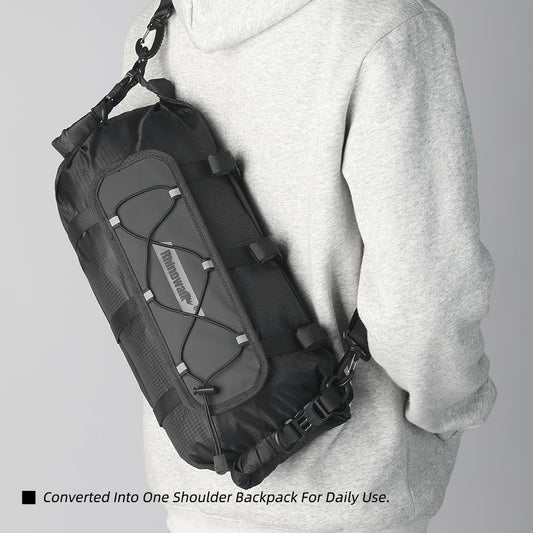 Person wearing a black and gray Bike Bag backpack on a plain background