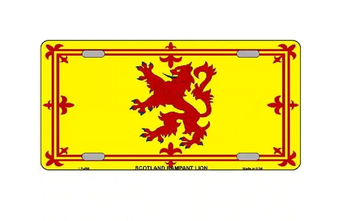 A novelty license plate featuring the red Scotland rampant lion on a bright yellow background, with a red decorative border and small mounting holes.