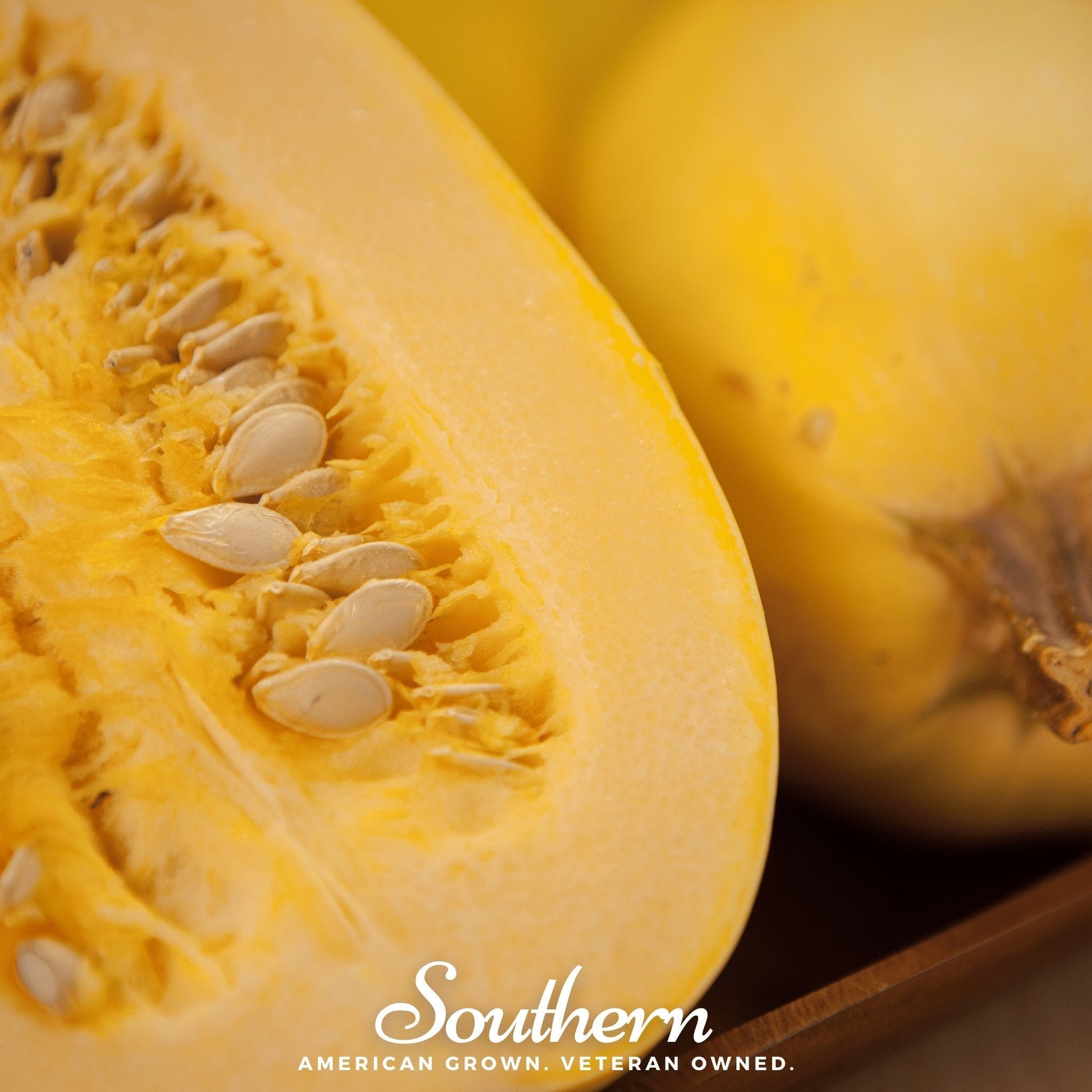 Close-up of a yellow squash with seeds, branded 'Southern'.