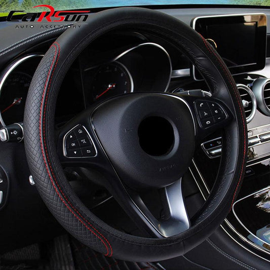 Steering wheel with red stitching in a car interior, featuring the brand 'CarSun'.