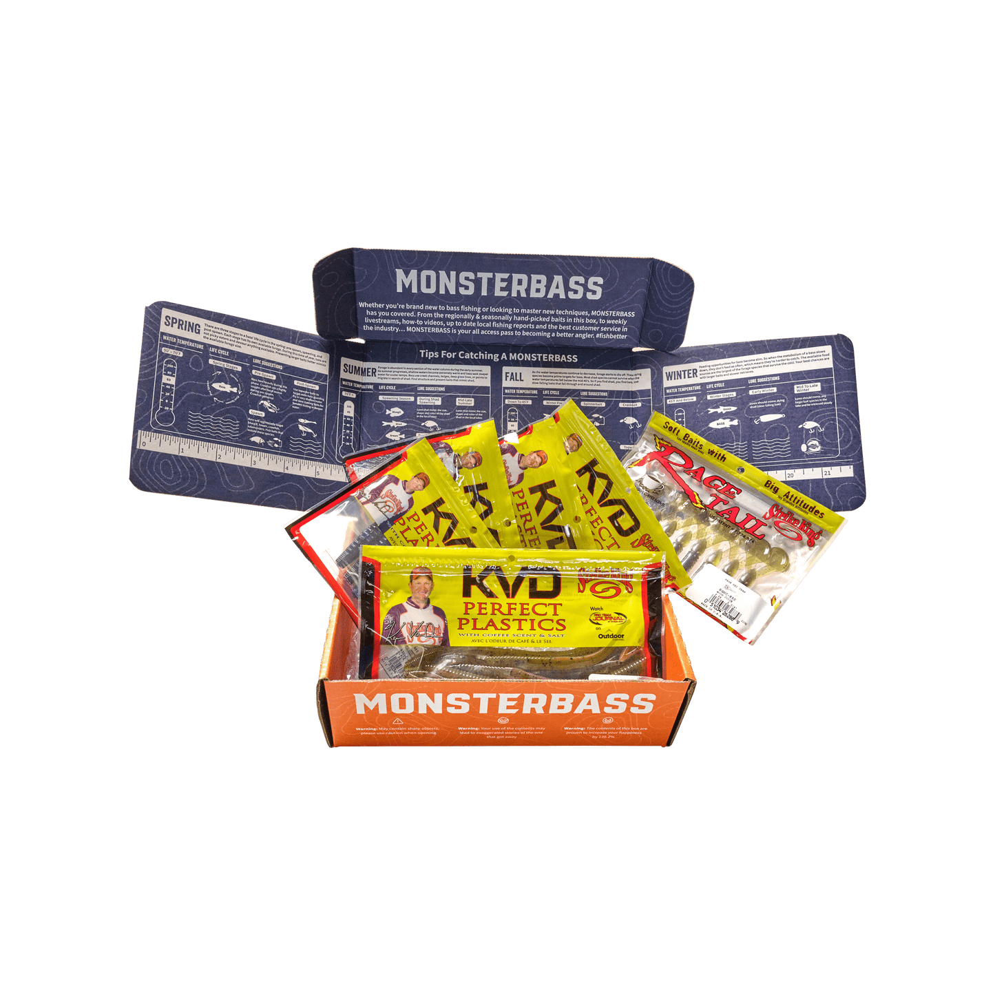 Box of Monsterbass fishing lures with various packages inside on a green background