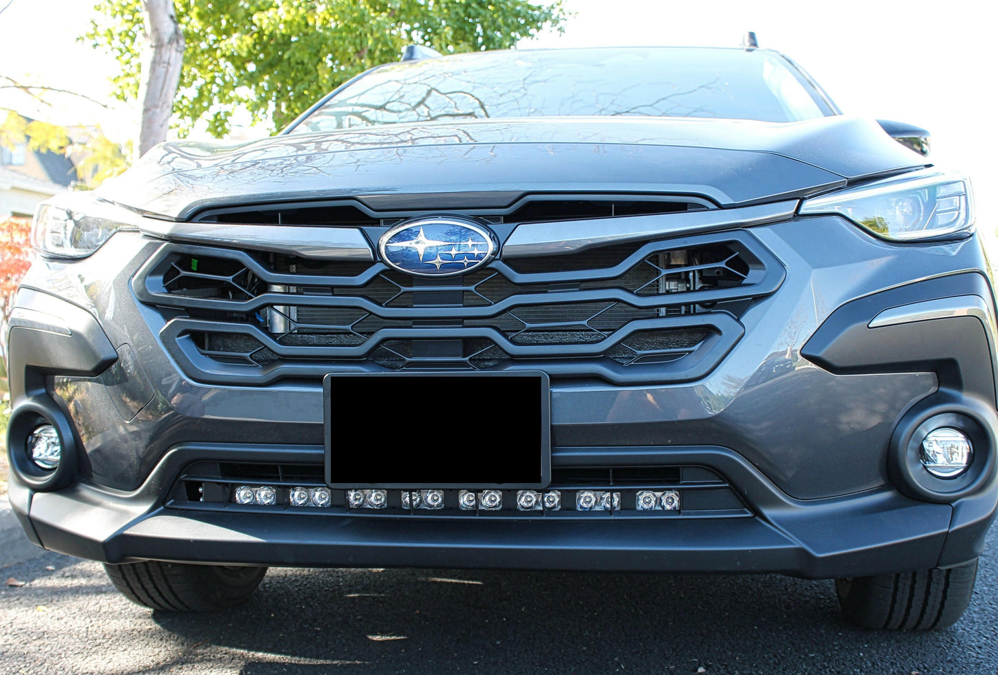 Front view of a Subaru vehicle with a clear background