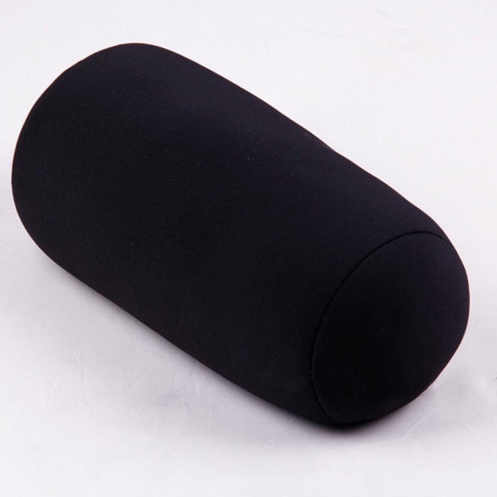 Black cylindrical pillow on a white background