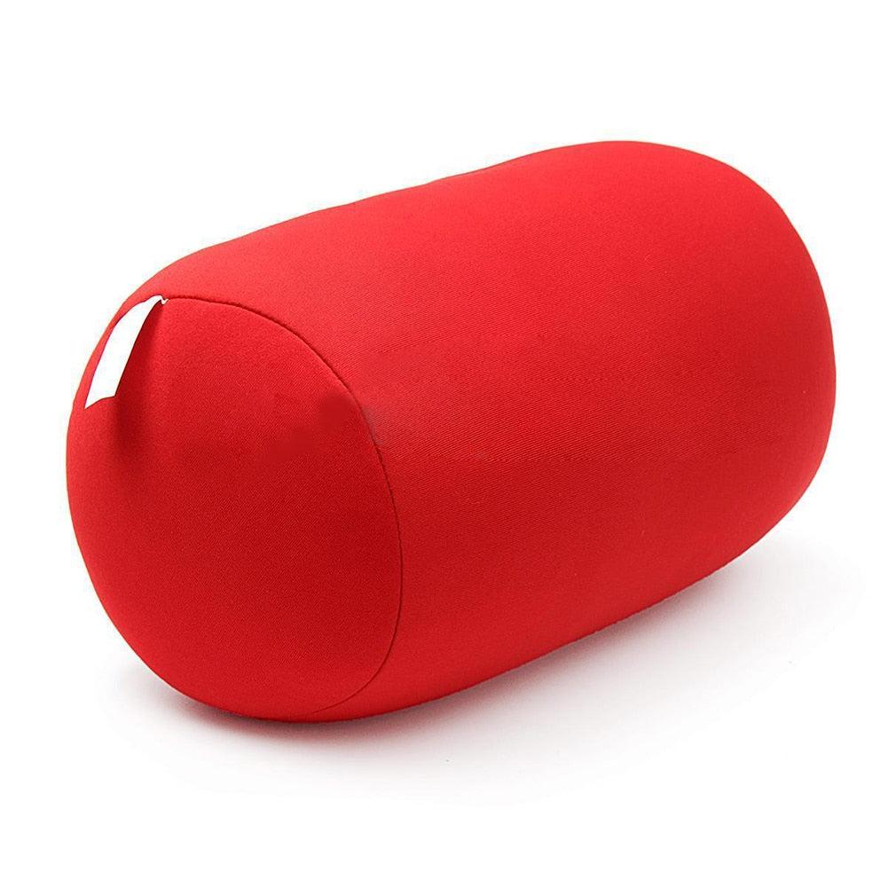 Red cylindrical pillow on a white background