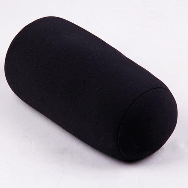 Black cylindrical pillow on a white background