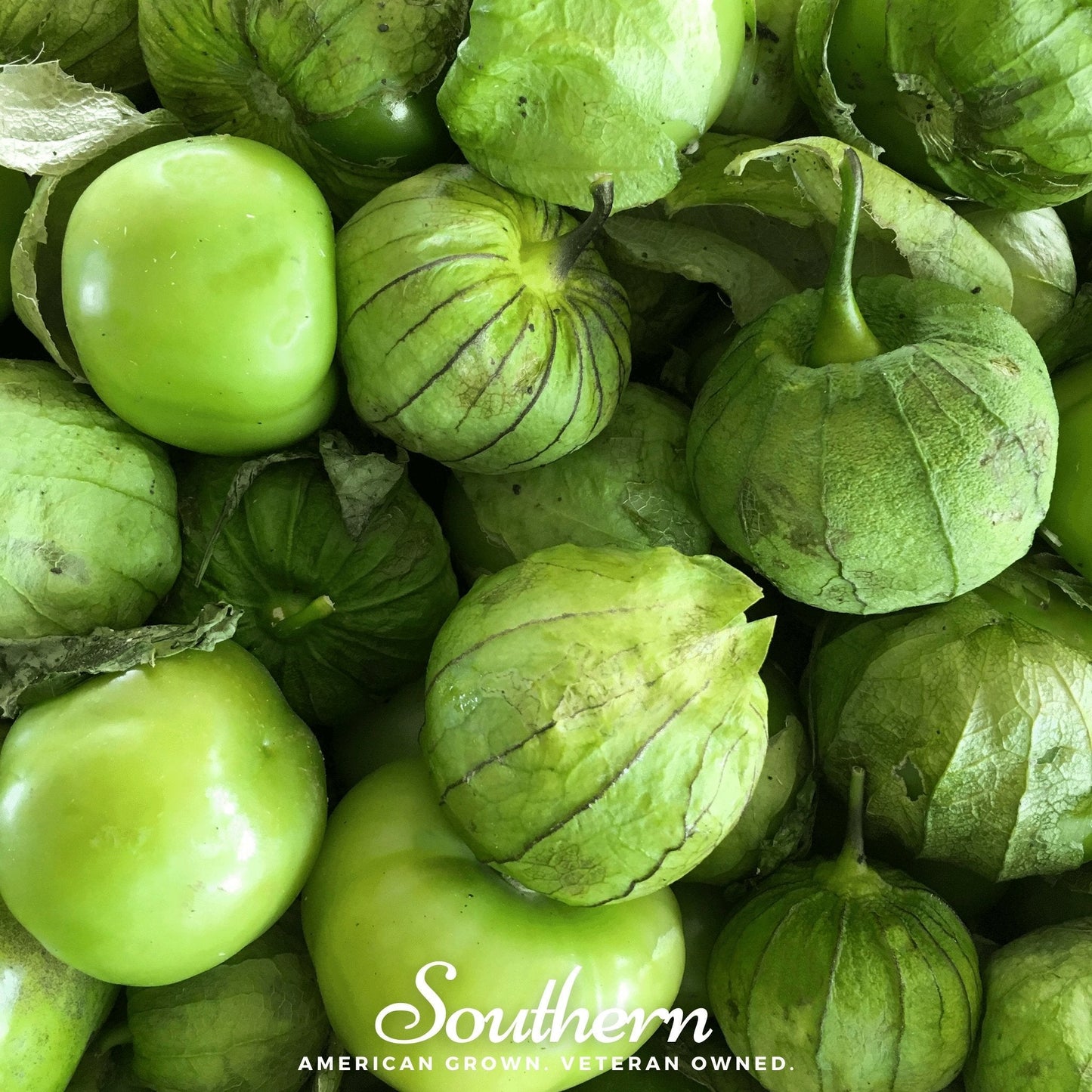 Close-up of green tomatillos with 'Southern' brand logo.