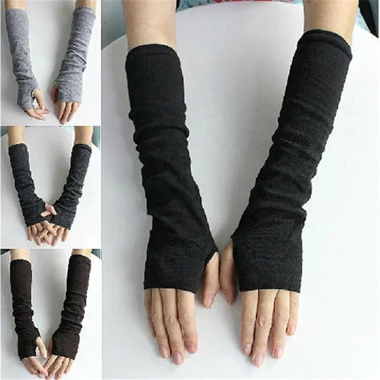 Black arm warmers on a white background