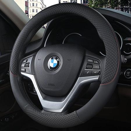 Steering wheel with BMW logo in a car interior