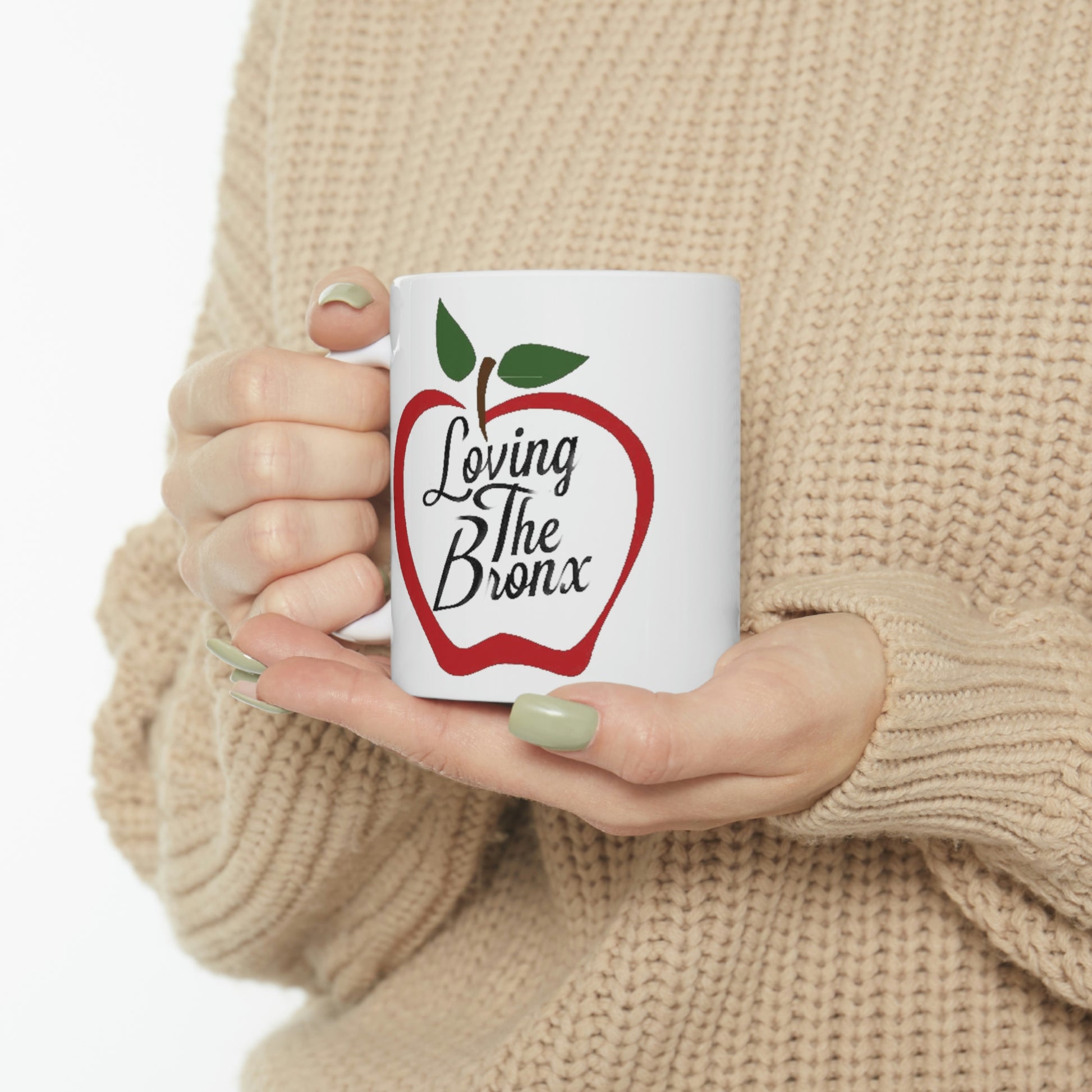 Model Holding Loving The Bronx Ceramic Mug 